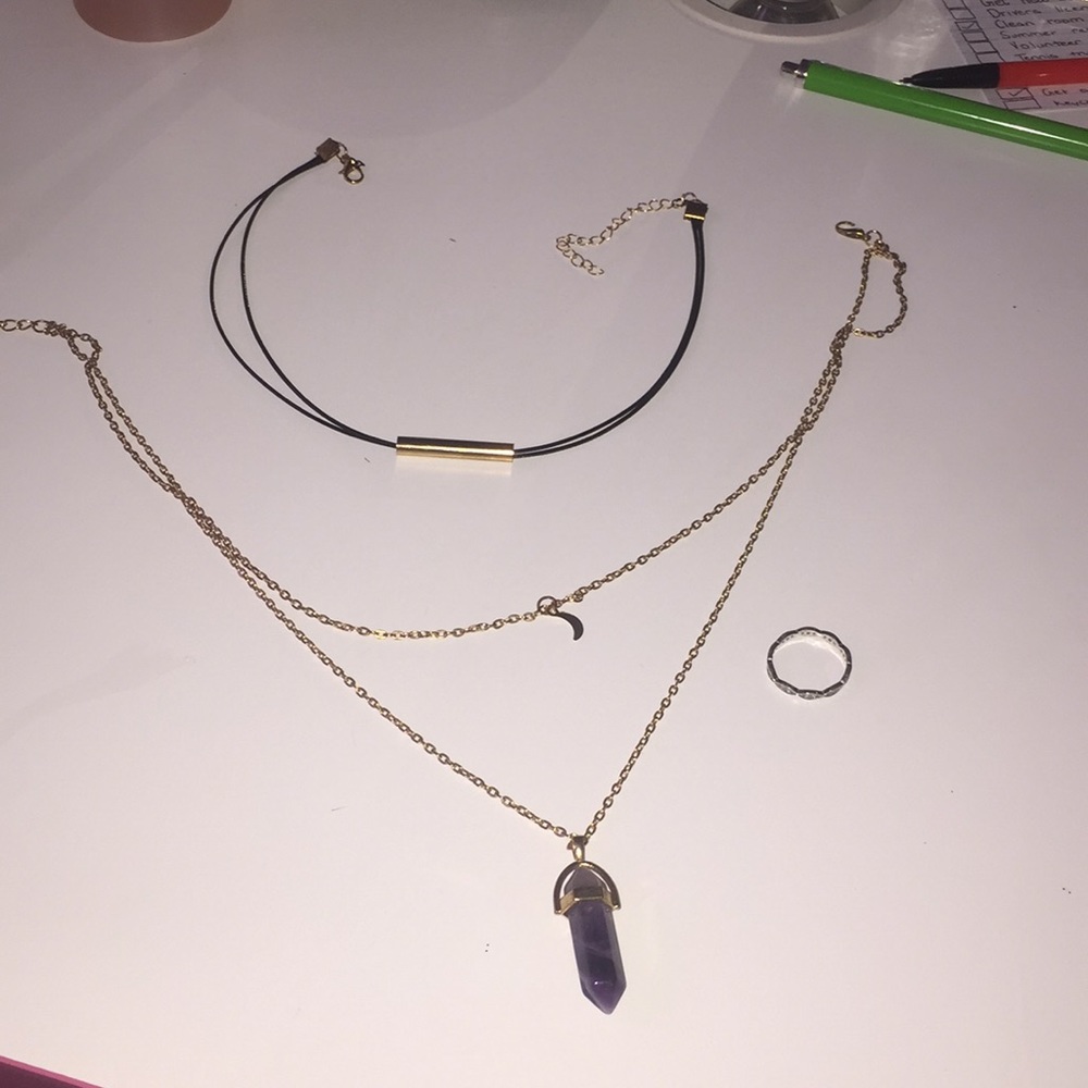 1 choker 1 long emerald necklace and 1 ring